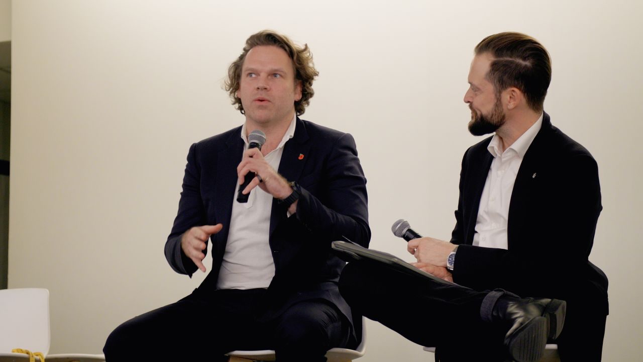 Marc C Lange moderating a panel with Patrick Schneider-Sikorsky